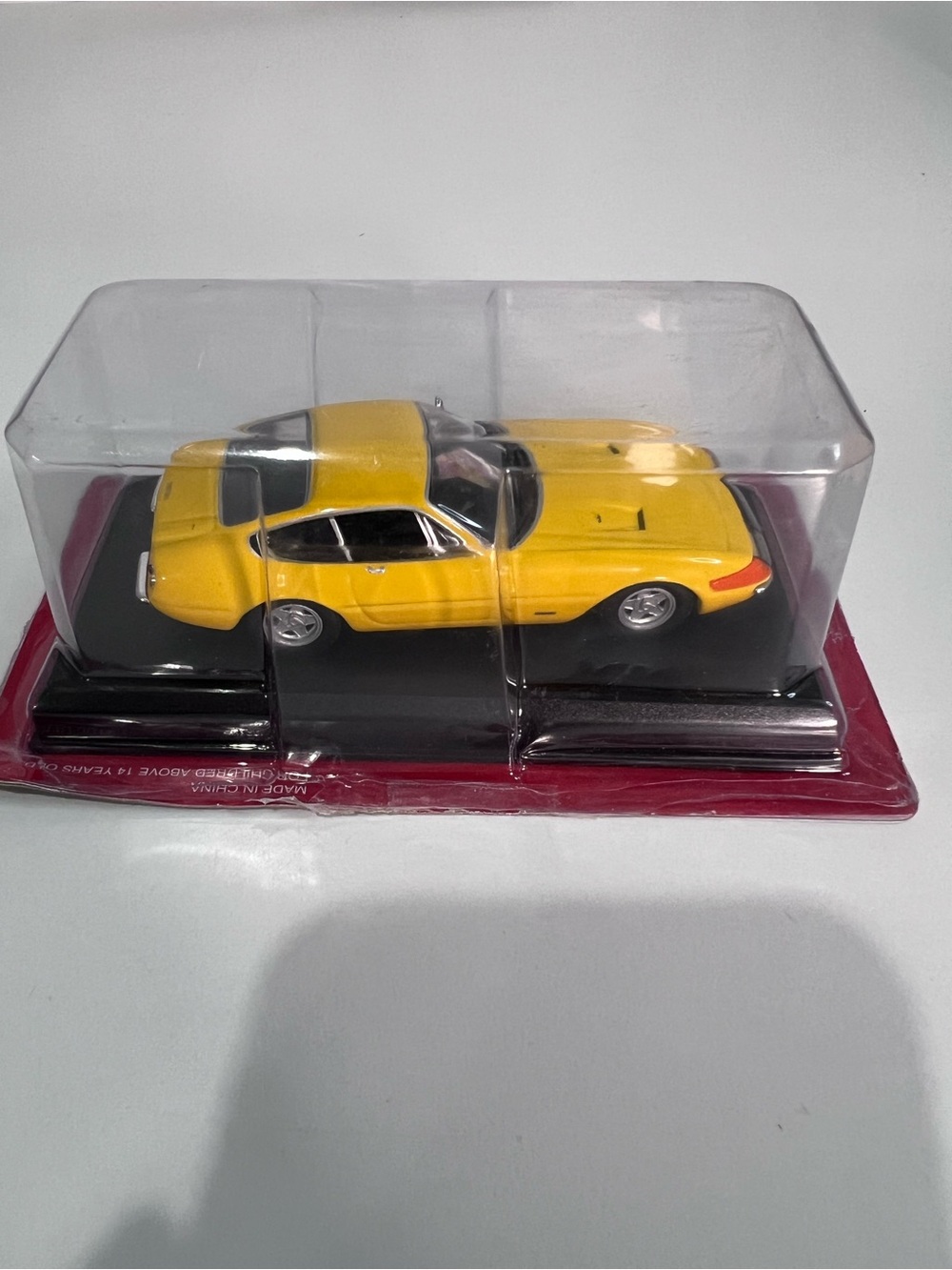 Vintage 1:43 Scale Yellow Ferrari Diecast Model Car in Display Case